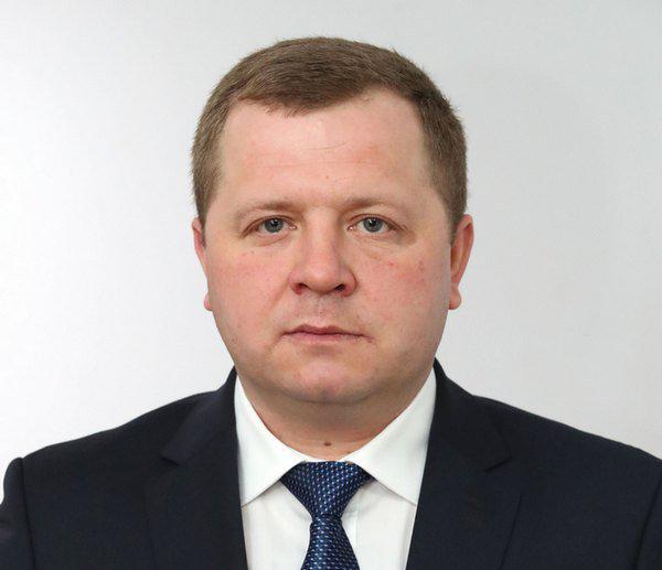 министр